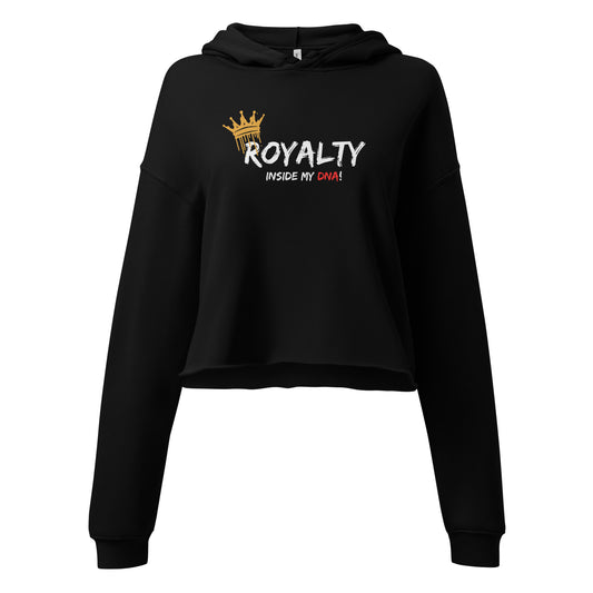 Black Woman wearing “Royalty Inside My DNA” cropped hoodie representing Black excellence and pride.